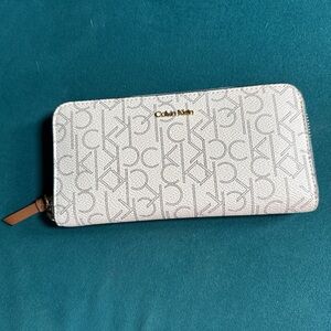 Calvin Klein White and Brown Monogram Zip Wallet